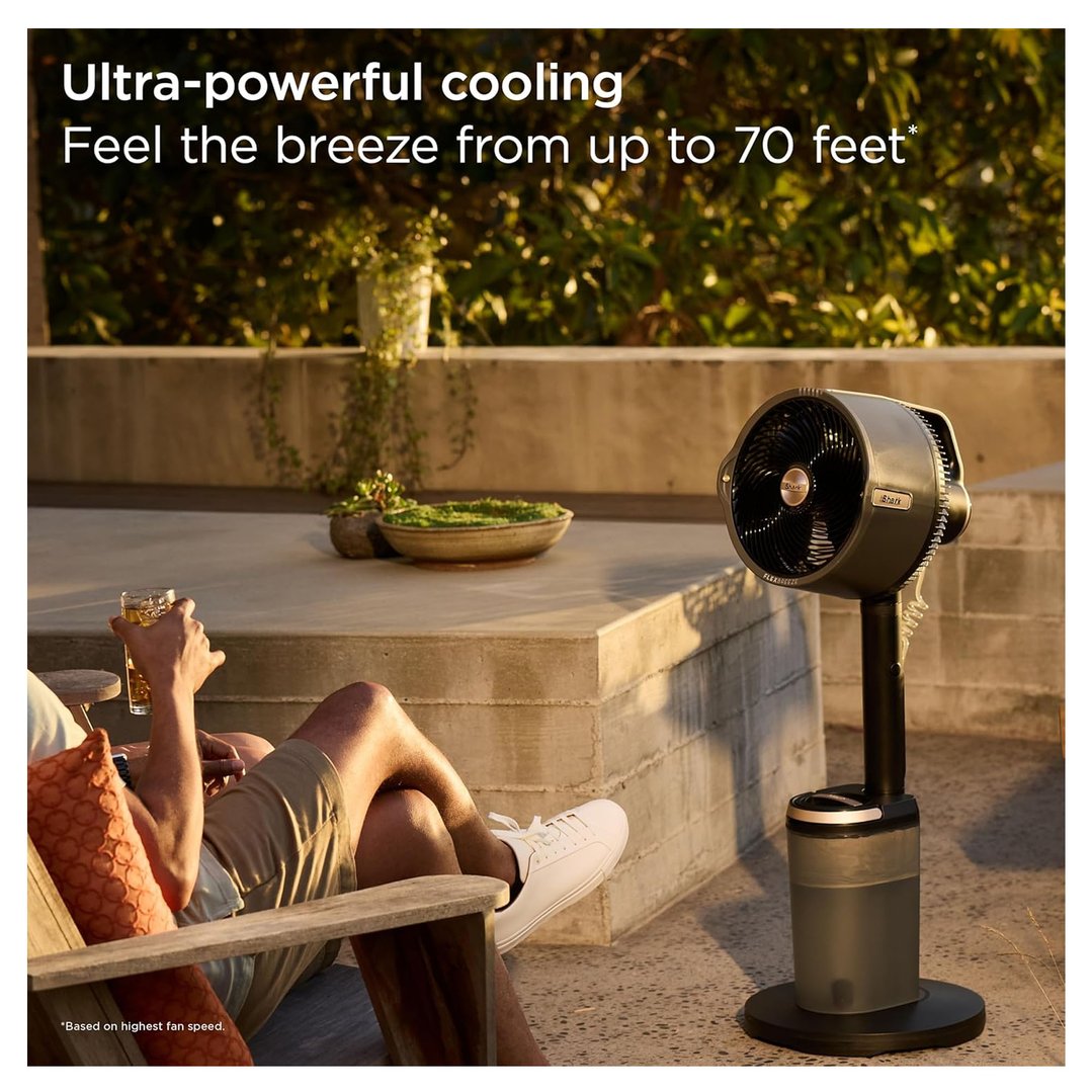 Man relaxing outdoors with a Shark FlexBreeze fan on a patio
