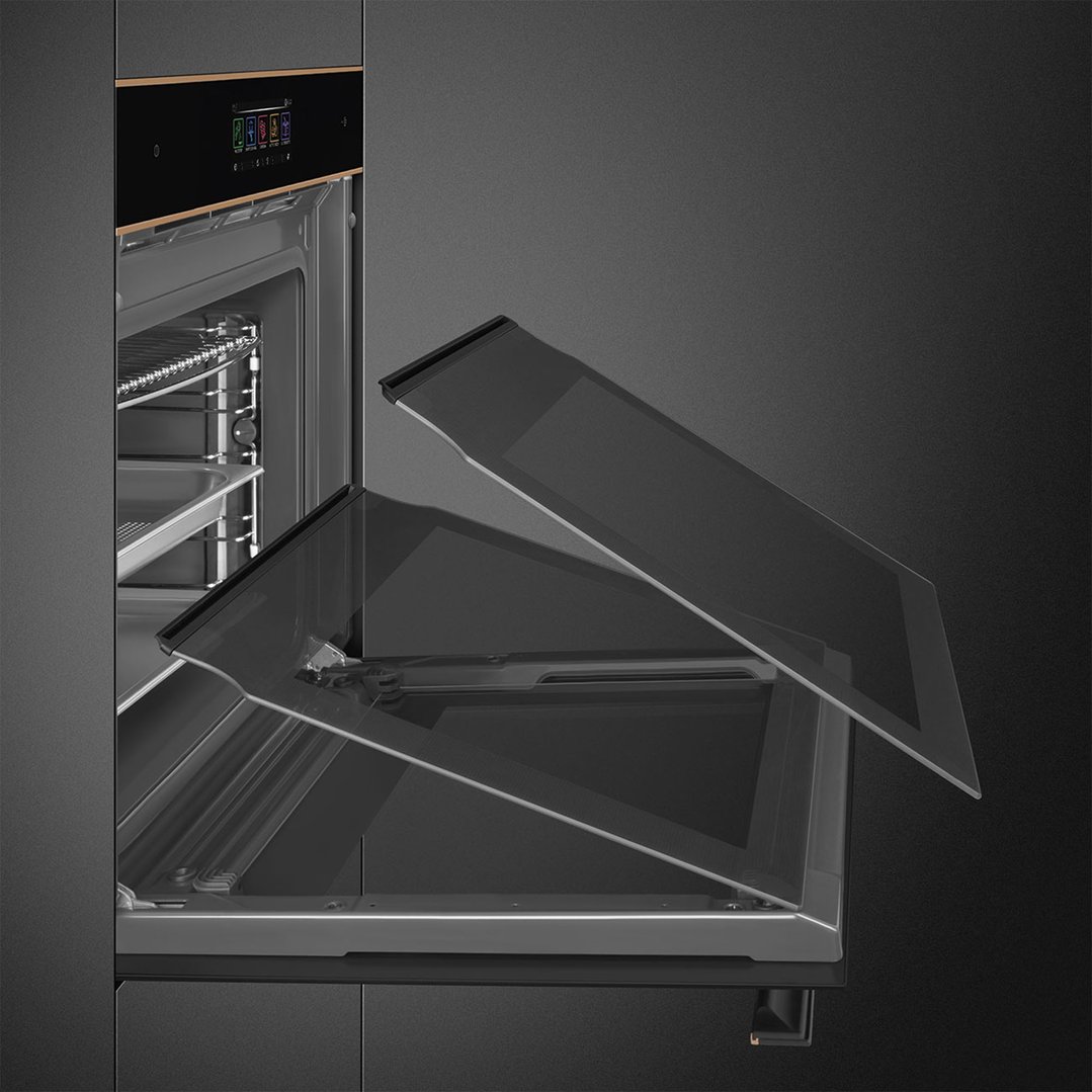 A black glass oven with its door partially open, revealing the interior