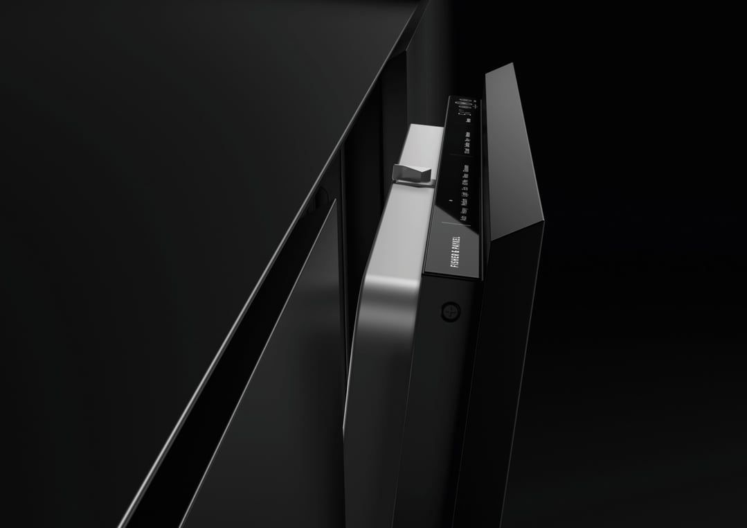 Close up of the control panel of a black integrated dishwasher