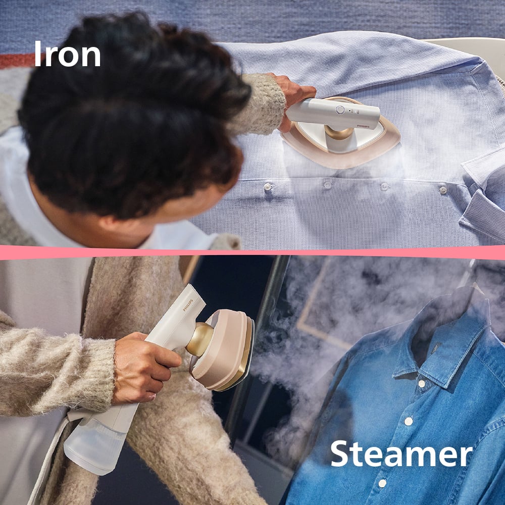 Person using a Philips OneTurn Hybrid Iron & Steamer on a shirt