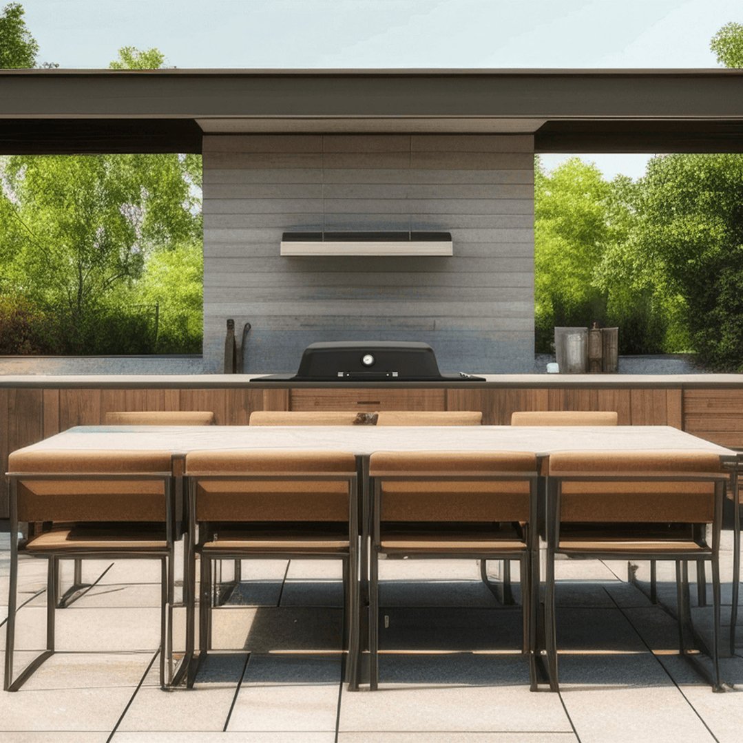 Built-in barbeque on an outdoor kitchen counter with a dining table