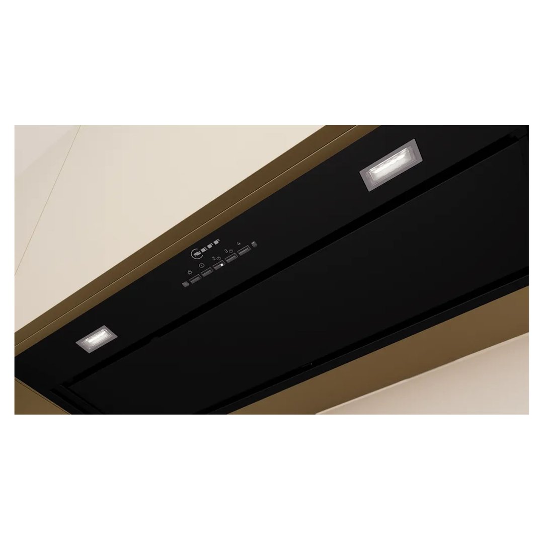 Black integrated rangehood with controls and lights in a kitchen setting