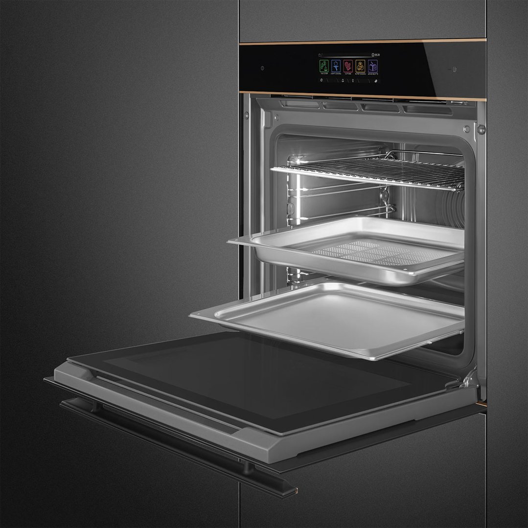 Open SMEG Dolce Stil Novo Steam100 Pro Oven with trays and rack inside
