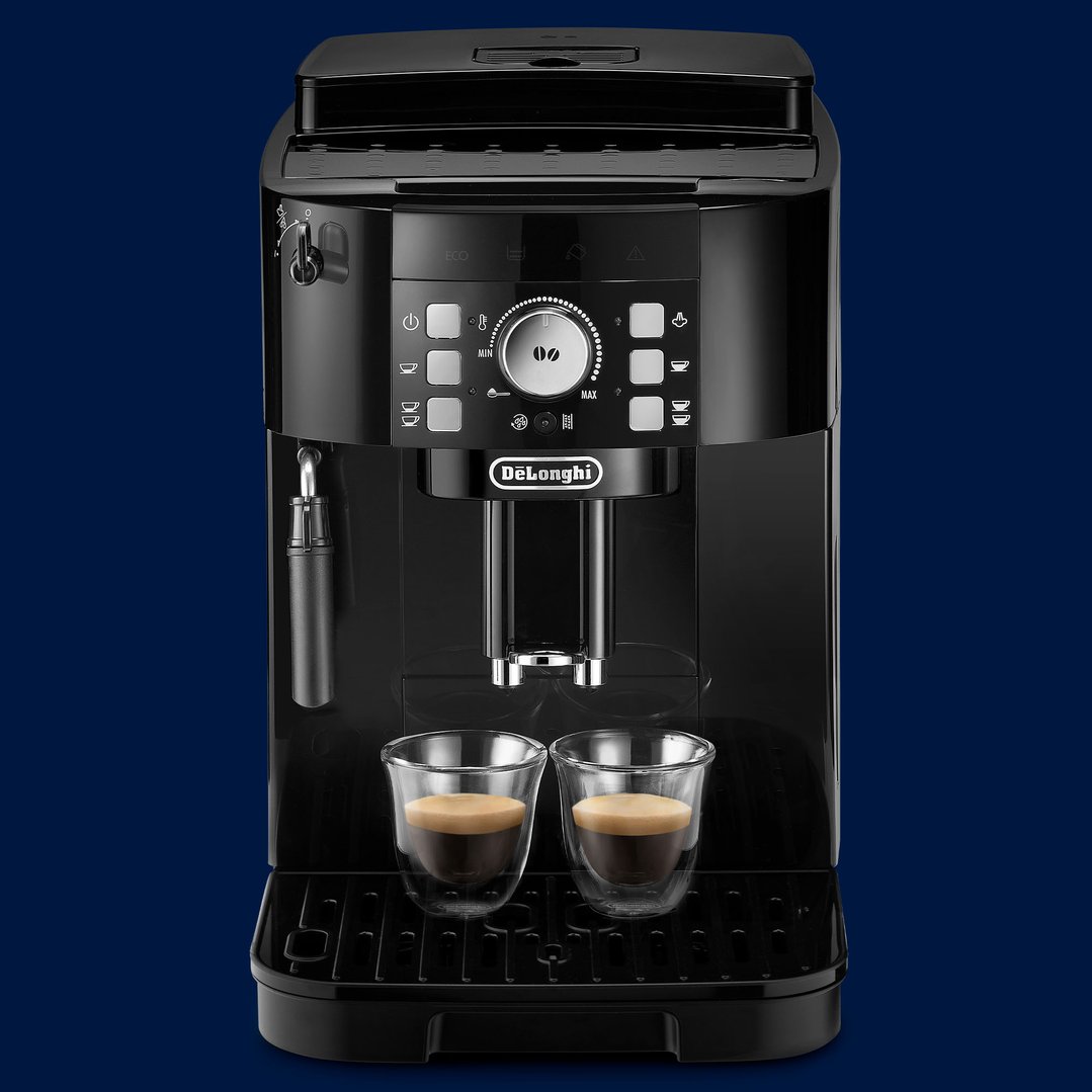 Black automatic coffee machine with two espresso cups on a dark blue background
