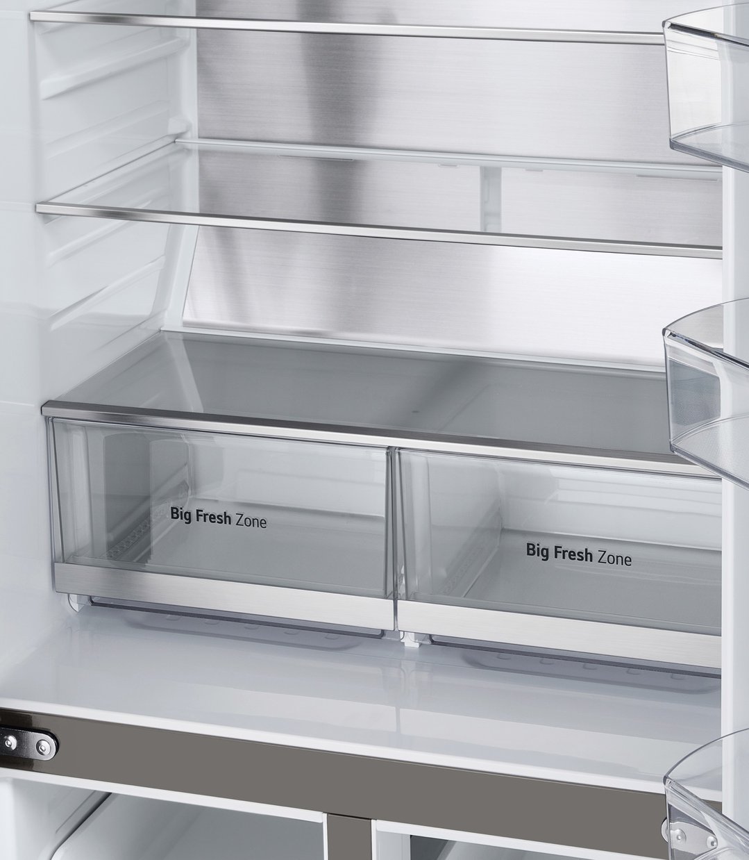 Interior view of a fridge showing shelves and two "Big Fresh Zone" drawers