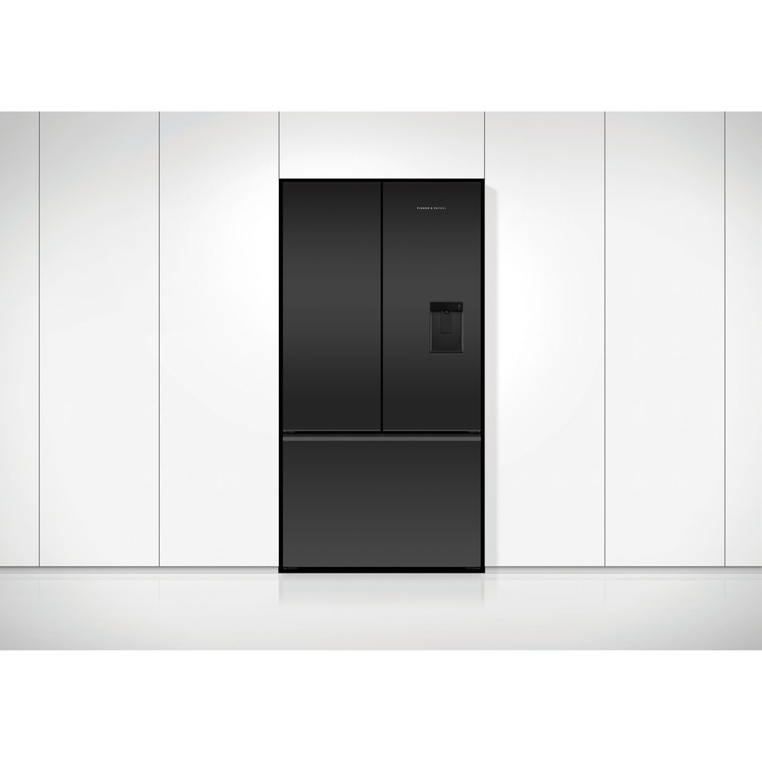 Black French door refrigerator freezer with ice and water dispenser in a kitchen