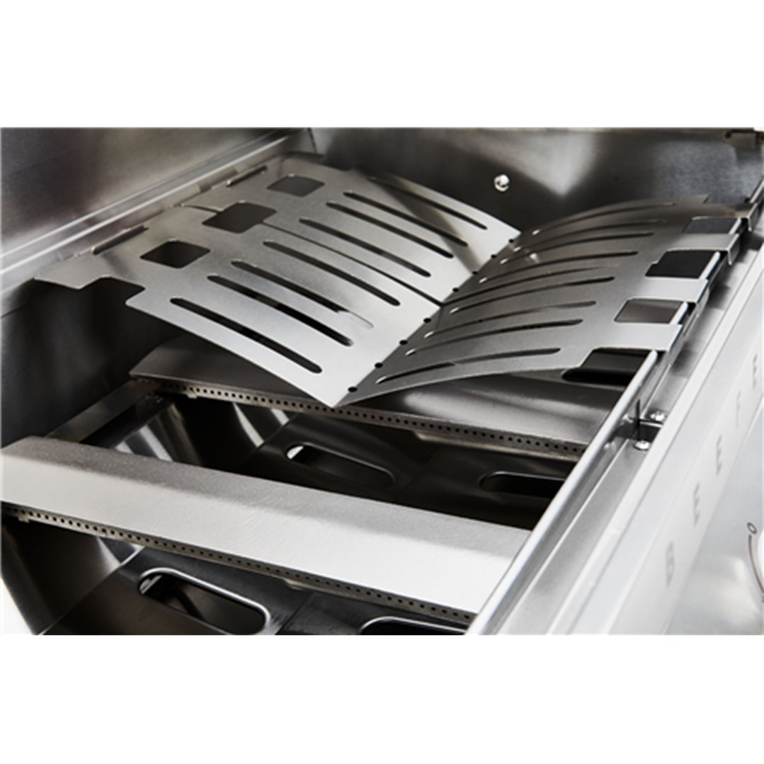 Close up of the internal components of a stainless steel barbeque