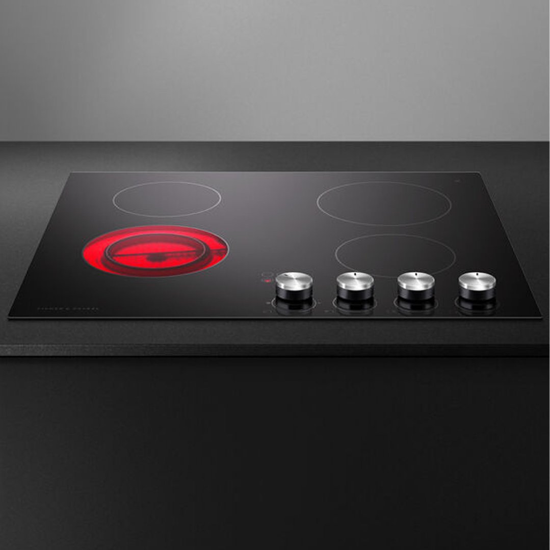 Electric cooktop with one red-hot element, built into a dark countertop