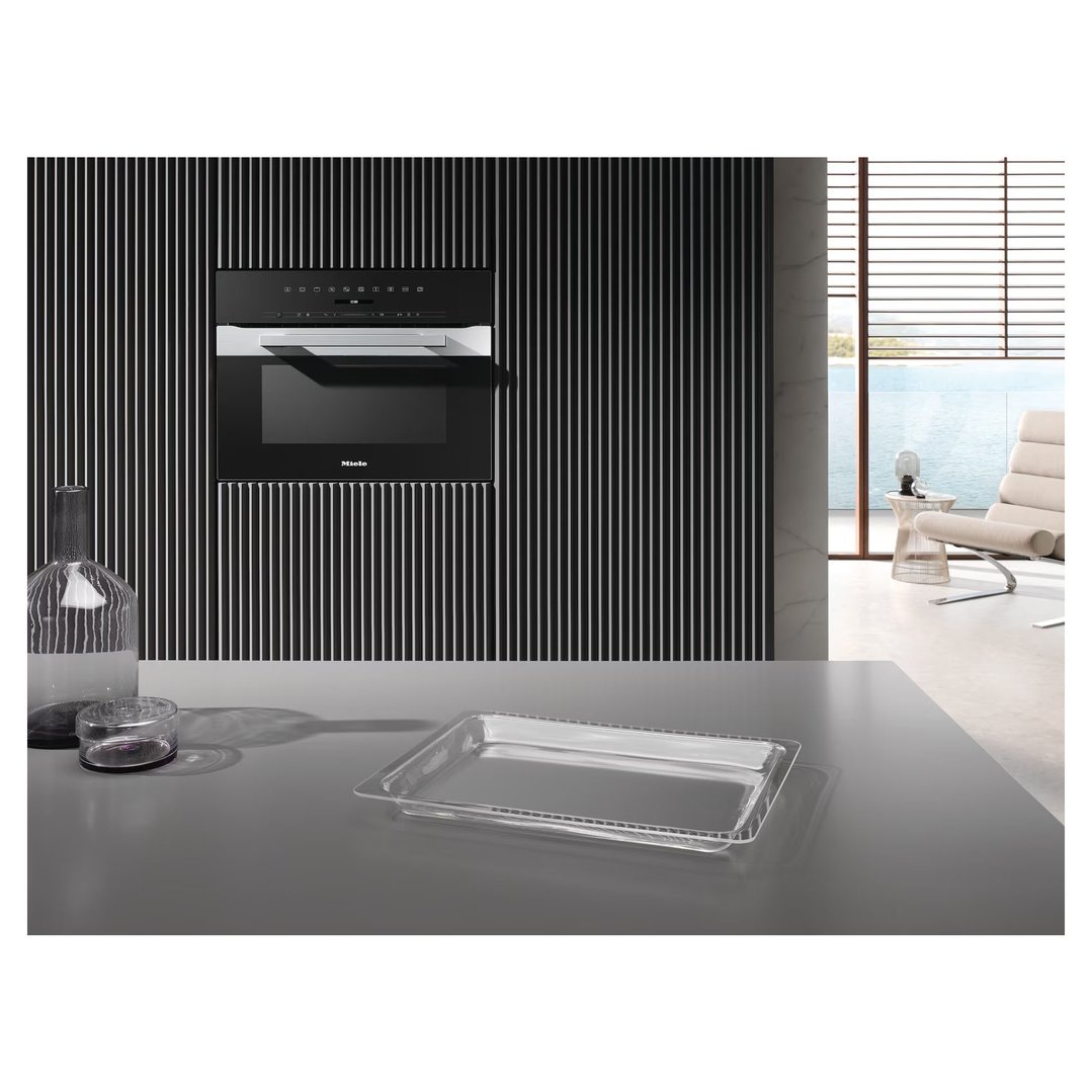 Built-in speed oven in a modern kitchen with a view of the ocean