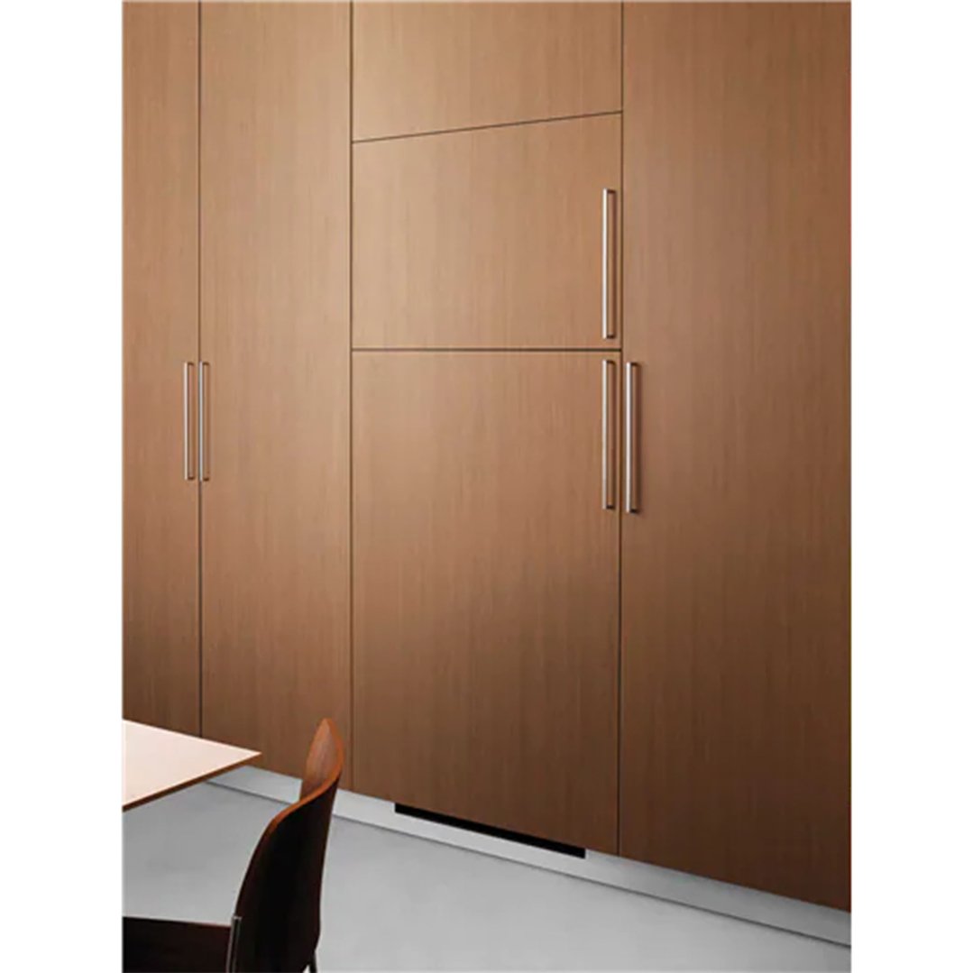 Built-in refrigerator integration kit with wooden panels in a modern kitchen setting