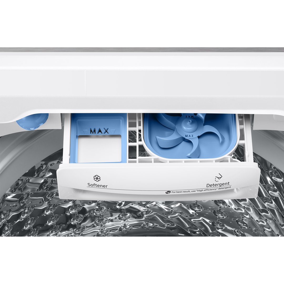 Close-up of a washing machine's detergent and softener dispenser