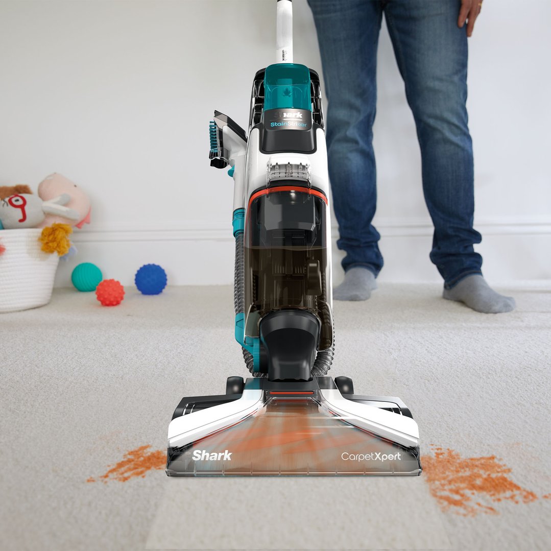Shark CarpetXpert deep carpet cleaner removing orange stain from carpet