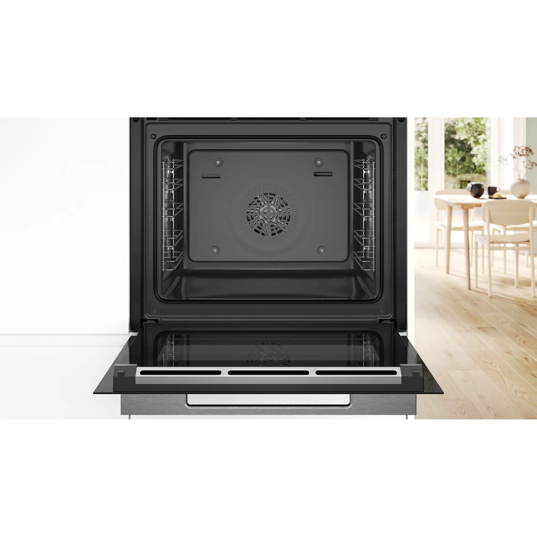Open Bosch Series 8 multifunction oven in a modern kitchen setting