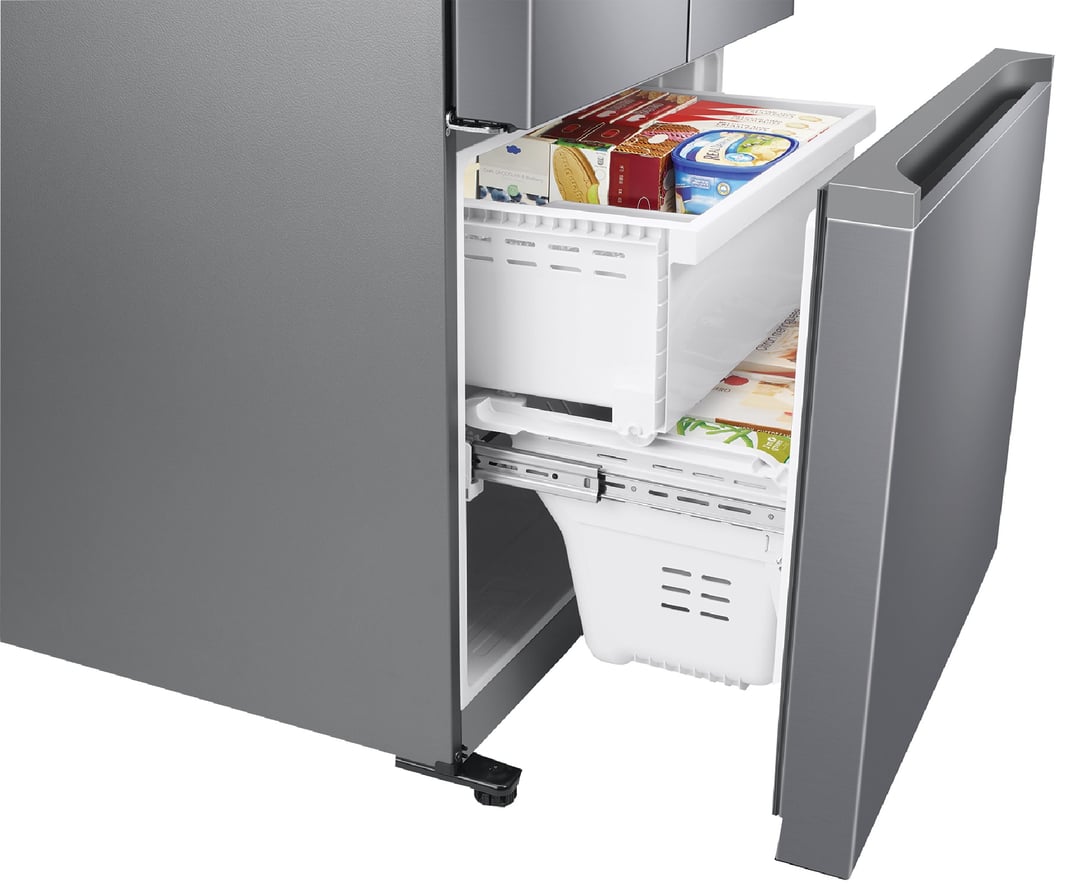 Open bottom freezer drawer of a French door refrigerator with food items inside