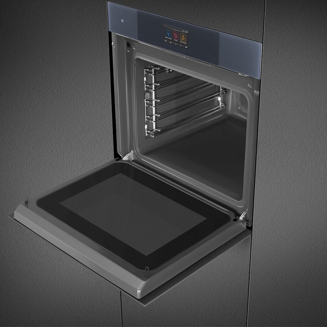 Open SMEG Linea 60cm Omnichef oven built into a dark grey kitchen cabinet