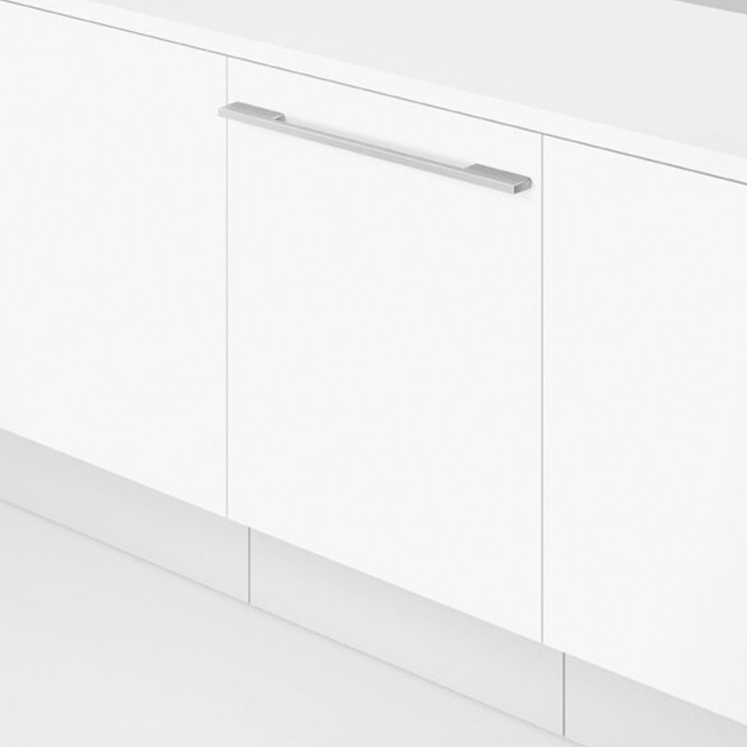 Integrated dishwasher with a silver handle in a white kitchen setting