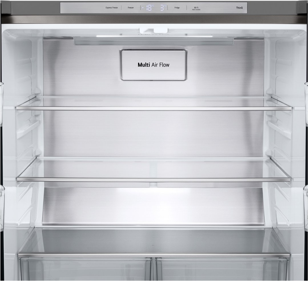 Interior view of a fridge with glass shelves and a "Multi Air Flow" panel