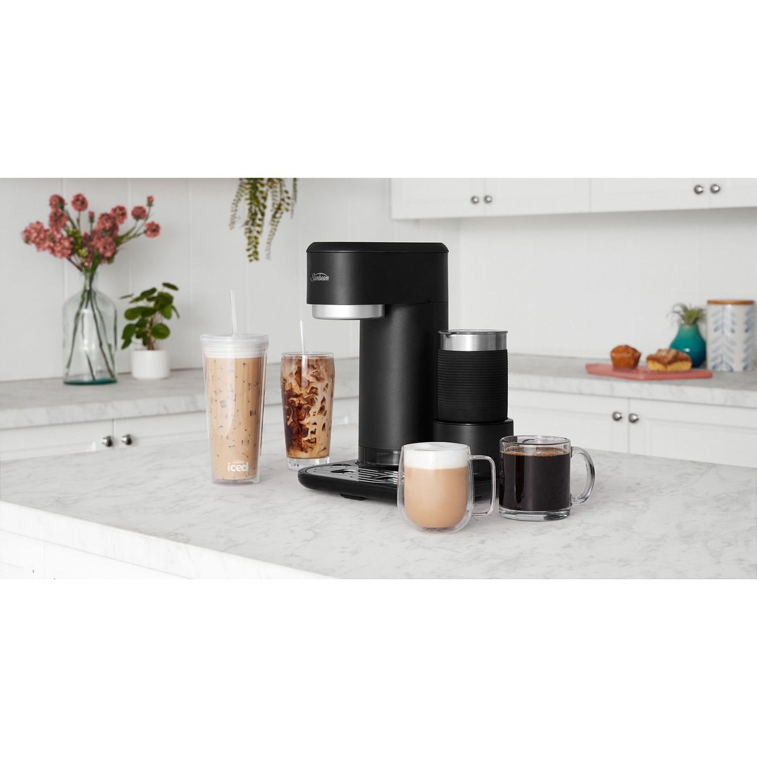 Sunbeam Iced + Hot Coffee Machine with various coffee drinks on a kitchen counter