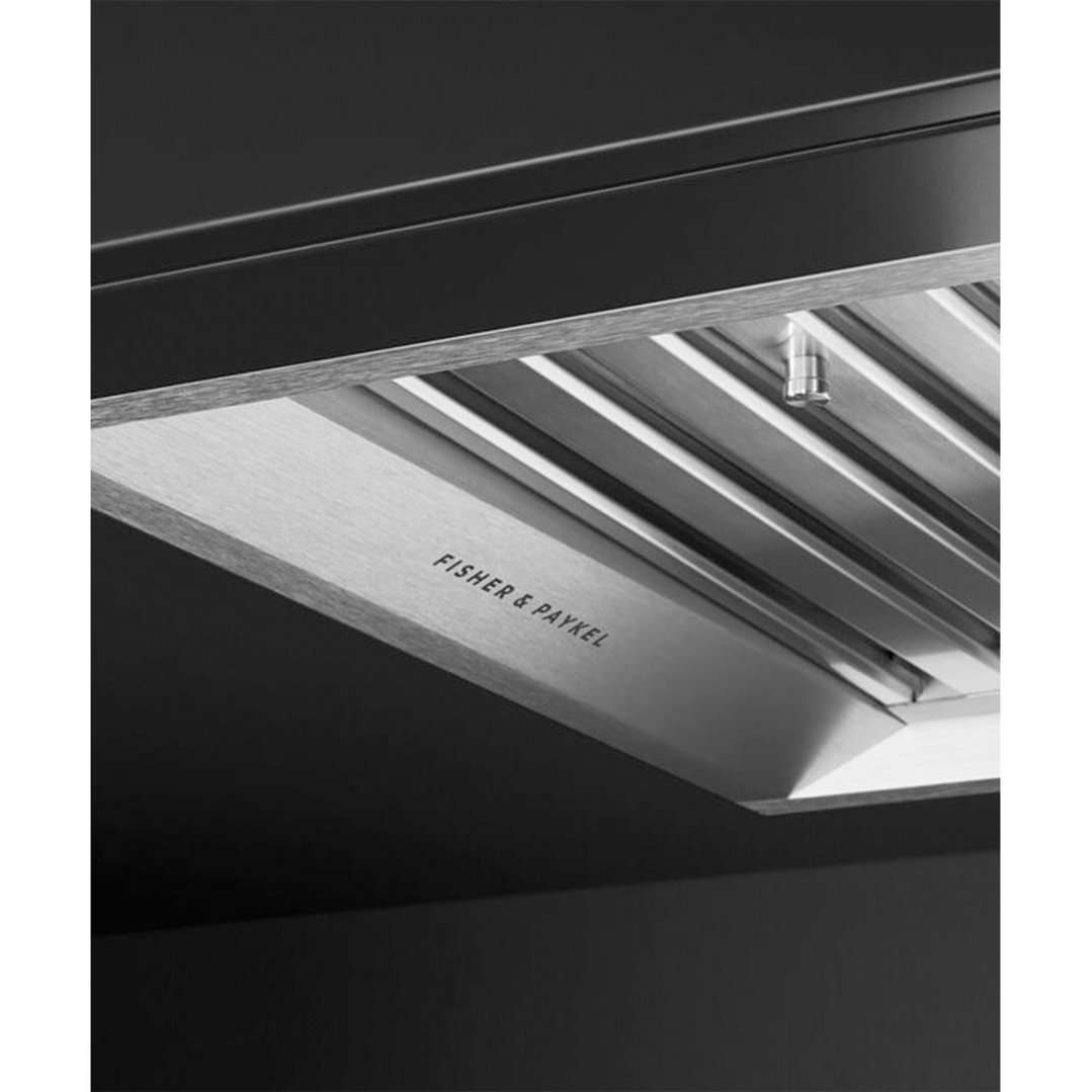 Close up of a stainless steel rangehood with "FISHER & PAYKEL" logo
