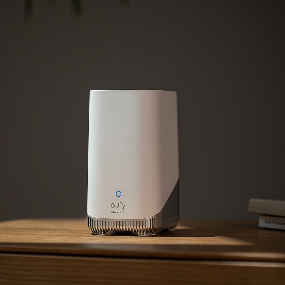 EUFY HomeBase 3 security camera hub on a wooden table