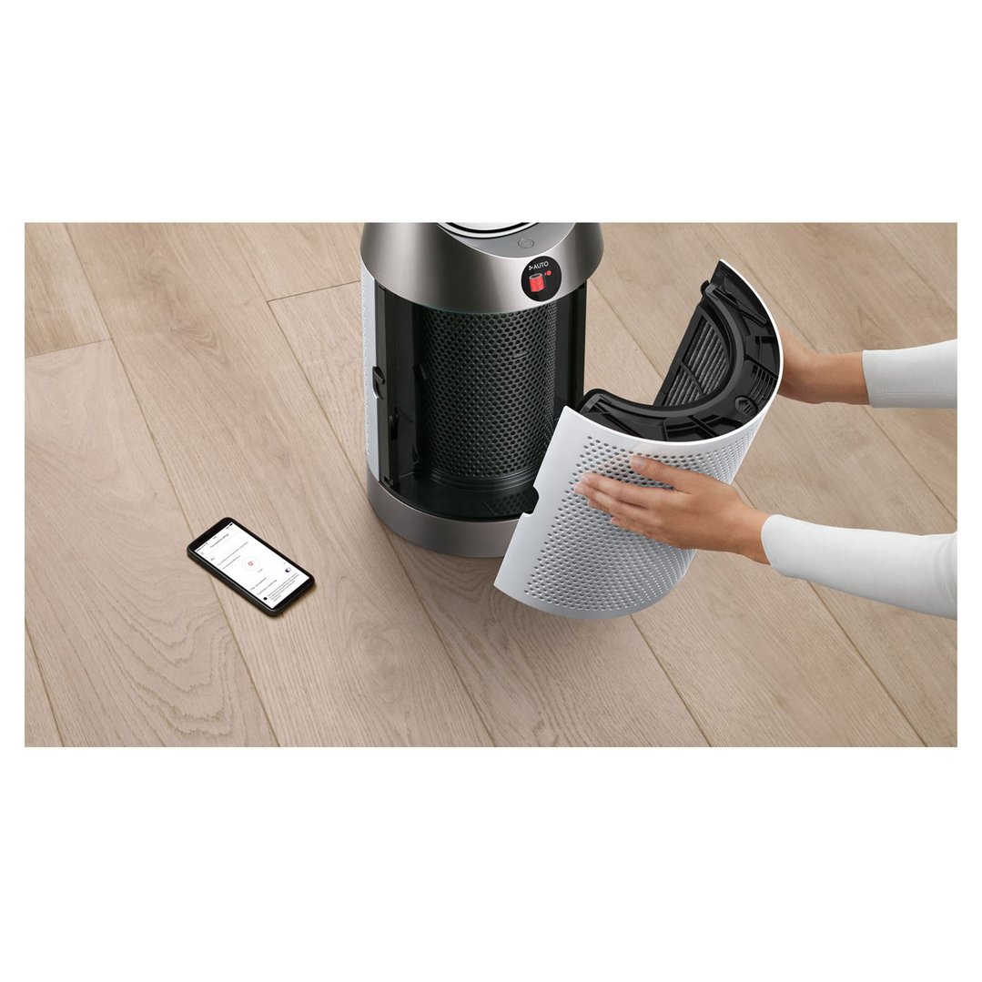 Hands removing the filter from a Dyson Purifier Cool purifying fan