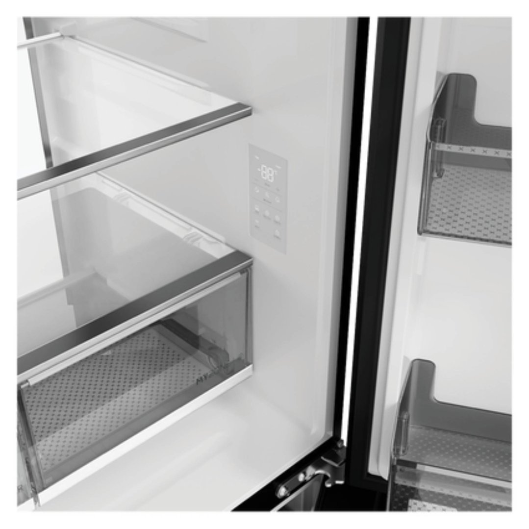 Interior view of a Haier refrigerator freezer with shelves and control panel