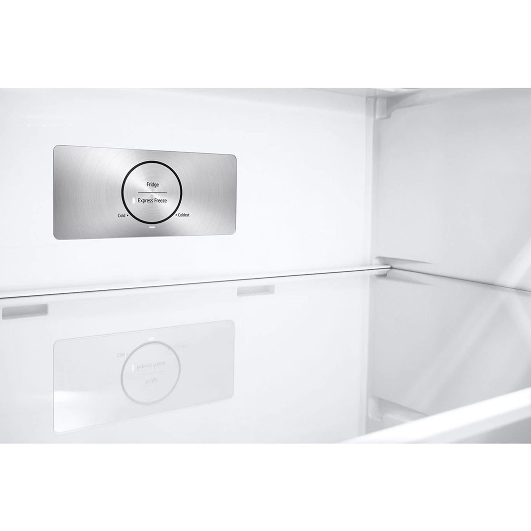 Interior of a fridge with a temperature control panel and glass shelves