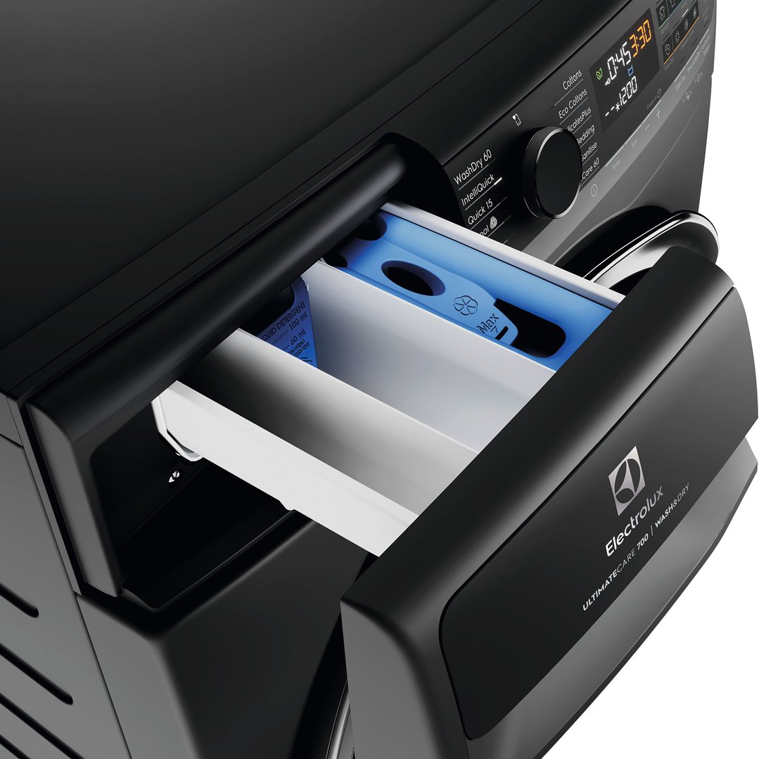 Close up of a black Electrolux washer dryer combo with the detergent drawer open
