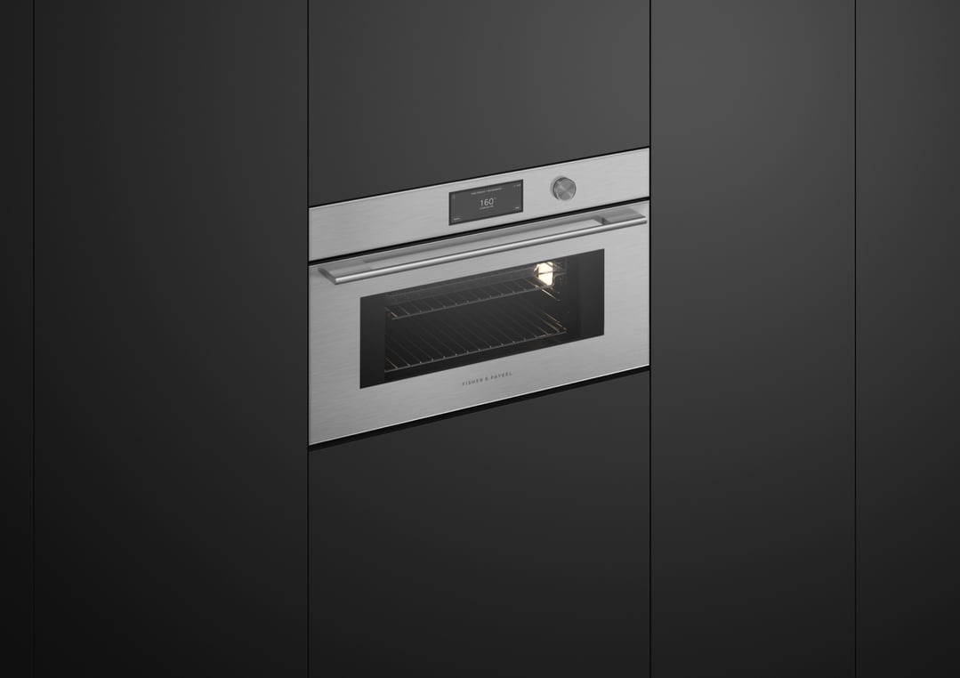 Built-in compact combi-steam oven with a digital display in a dark kitchen