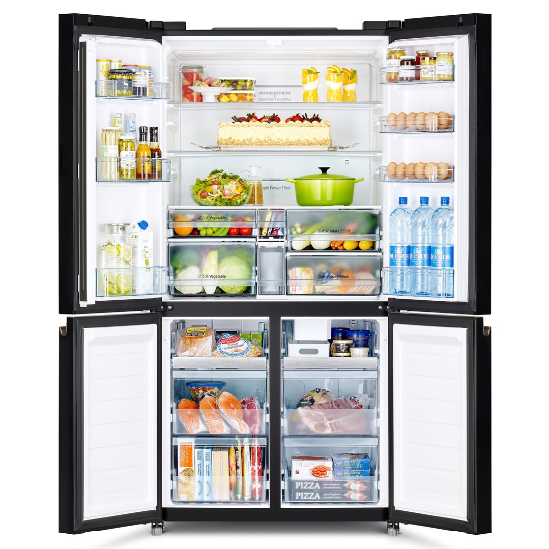 Open black French door fridge with food and drinks inside, on a white background