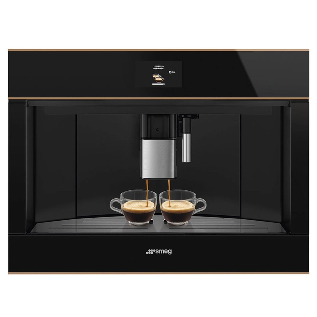 Built-in coffee machine dispensing espresso into two clear cups
