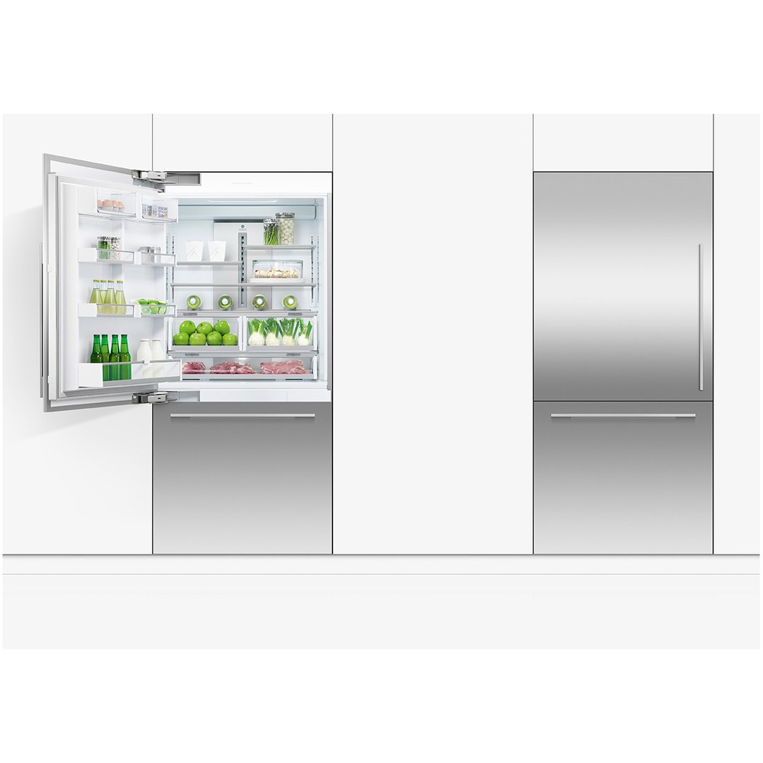 Integrated Refrigerator Freezer with open door showing food, next to closed unit