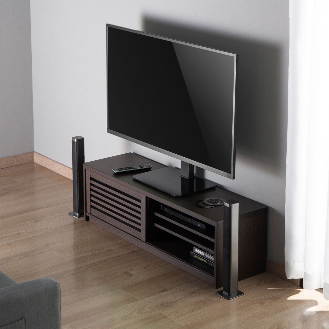TV on a table top TV stand in a living room setting