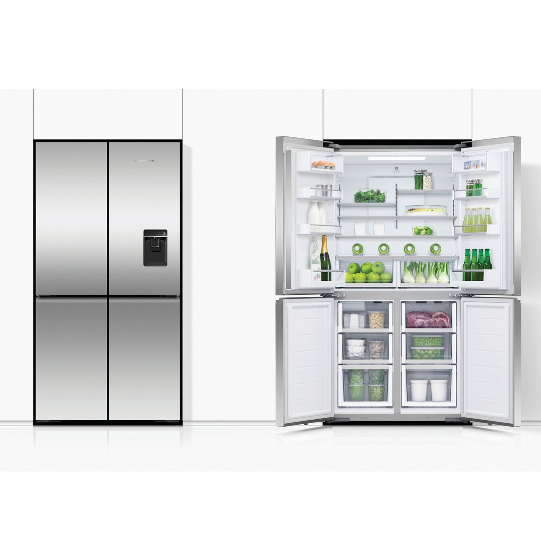 Two stainless steel quad door refrigerator freezers in a white kitchen setting