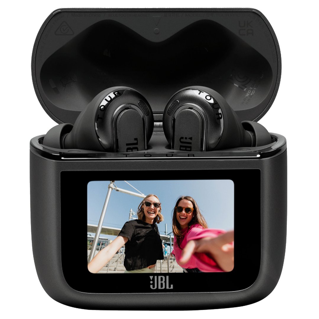 Black JBL Tour Pro 3 headphones in charging case with screen showing two women