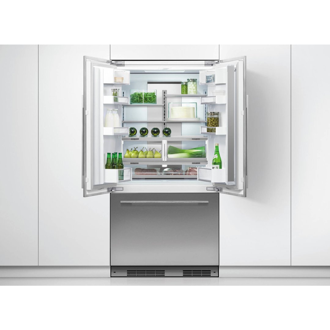 Integrated French Door Refrigerator Freezer with both doors open, filled with food