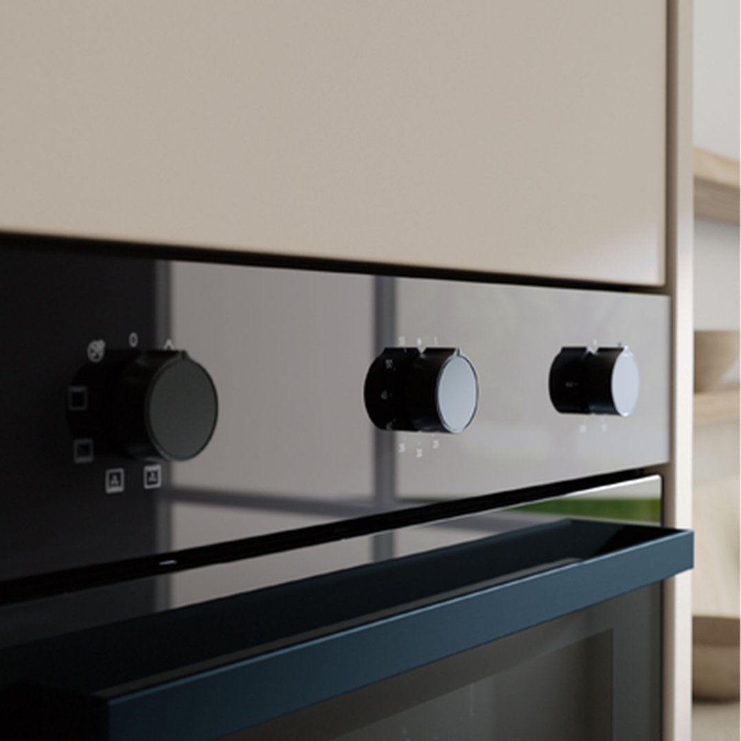 Built-in oven with three control knobs in a modern kitchen setting