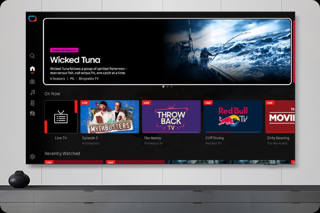 A TV displaying a streaming service interface, mounted on a wall