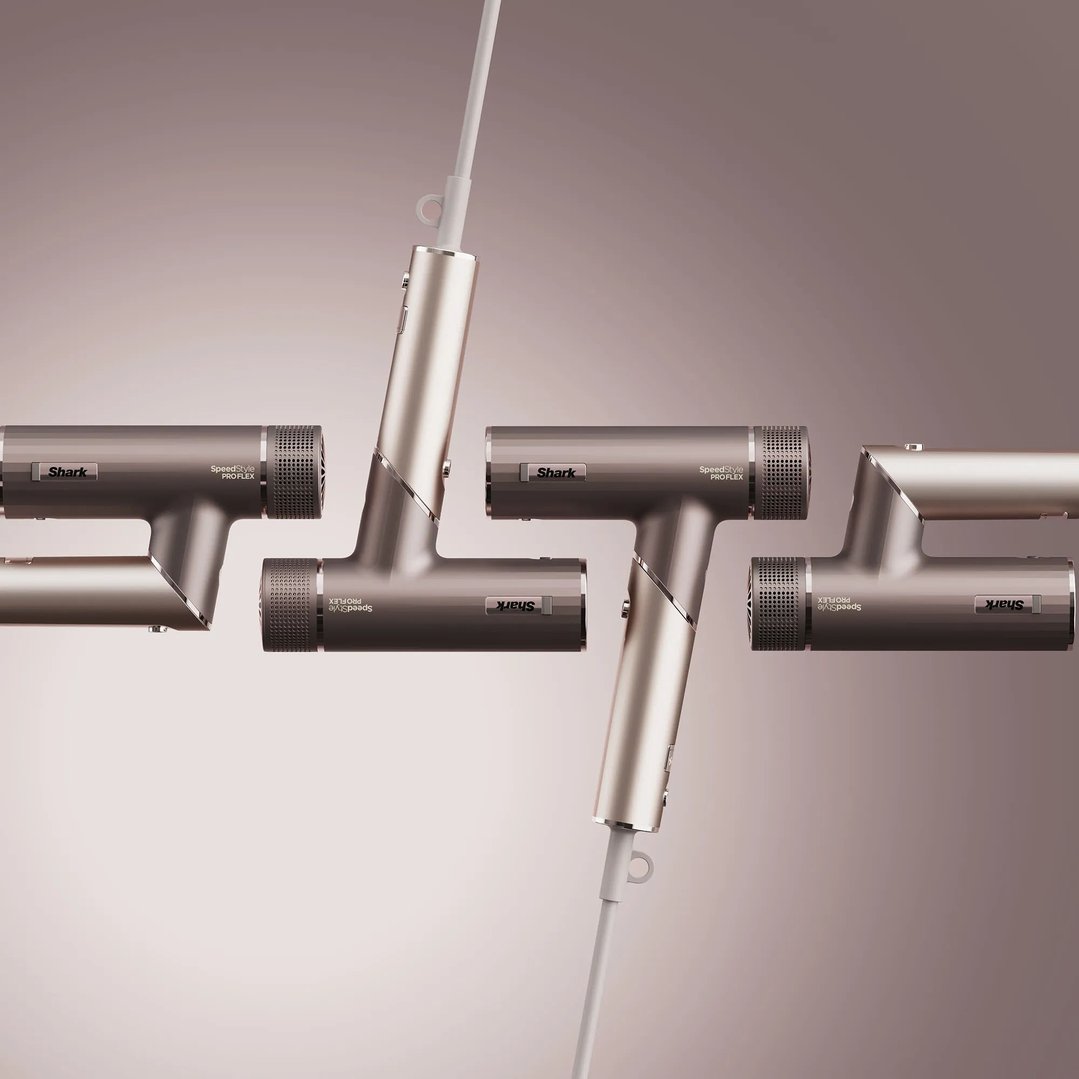 Four Shark SpeedStyle Pro FLEX hair dryers arranged in a dynamic pattern