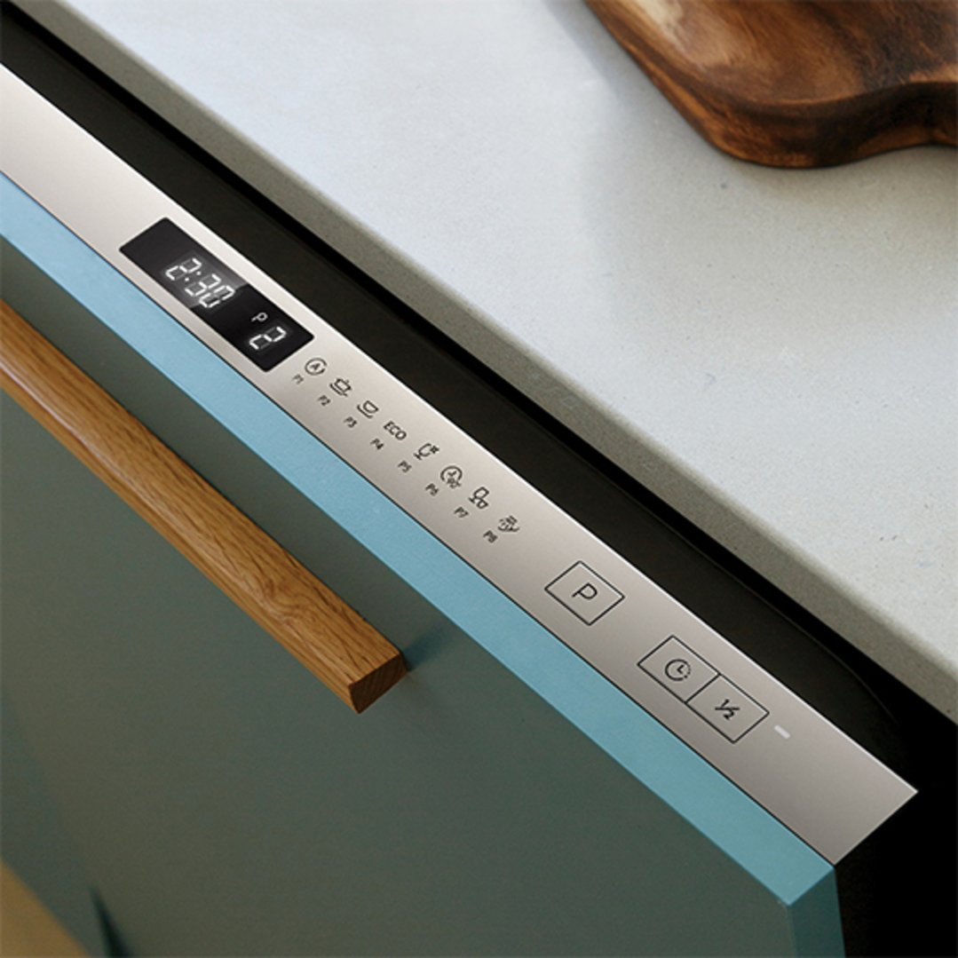 Close-up of a built-in dishwasher control panel with a wooden handle and countertop