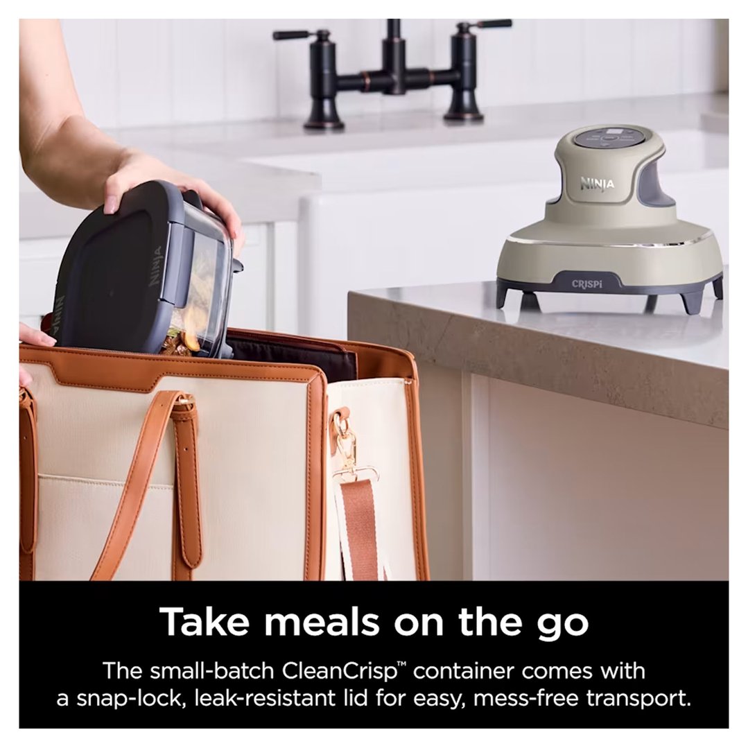 Person placing a CleanCrisp container into a tote bag, with the Crispi air fryer on a counter