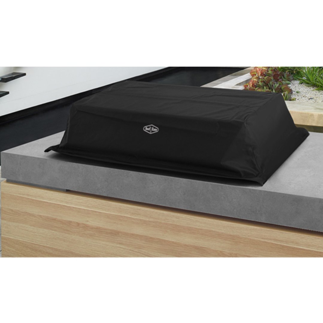 Black BBQ cover on a grey countertop with a wooden base outdoors