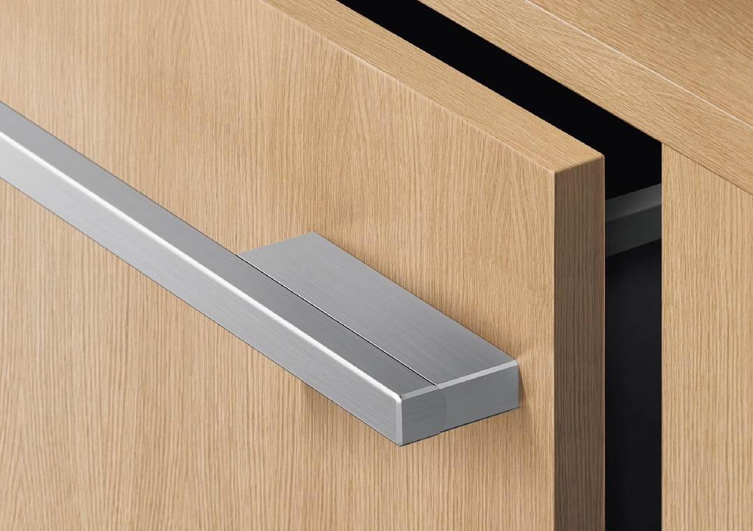 Close up of a partially open integrated double DishDrawer dishwasher