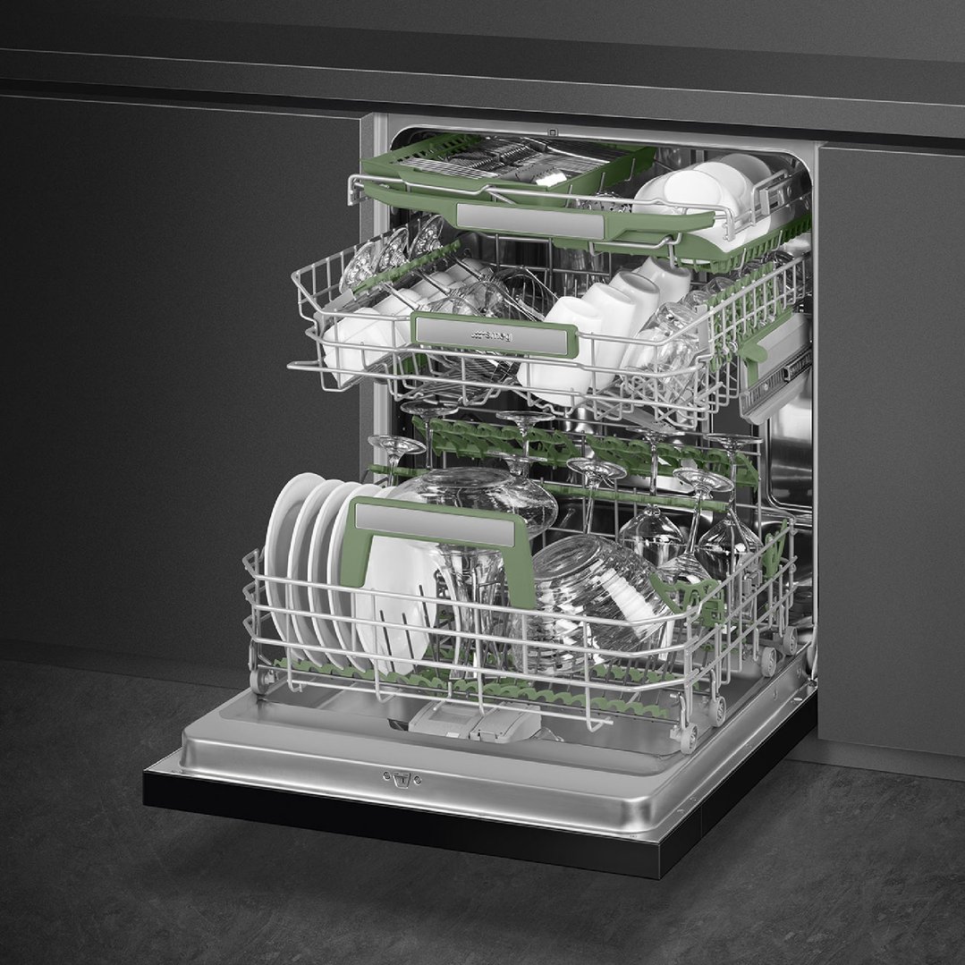 Open dishwasher with dishes and glasses inside, integrated into a dark kitchen