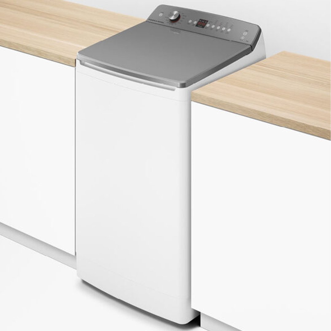 Fisher & Paykel 8kg Series 5 Top Loader Washer installed between wooden countertops