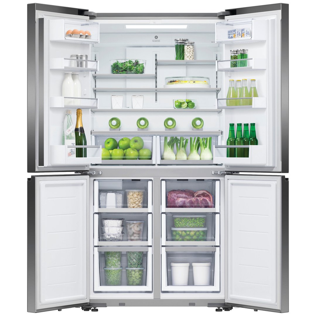 Open quad door refrigerator freezer filled with food and drinks