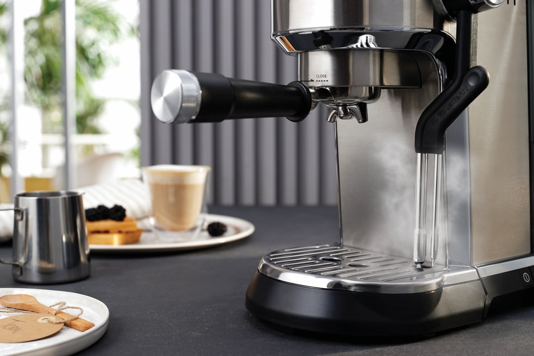 DeLonghi Dedica Maestro Plus Manual Coffee Machine in a kitchen setting