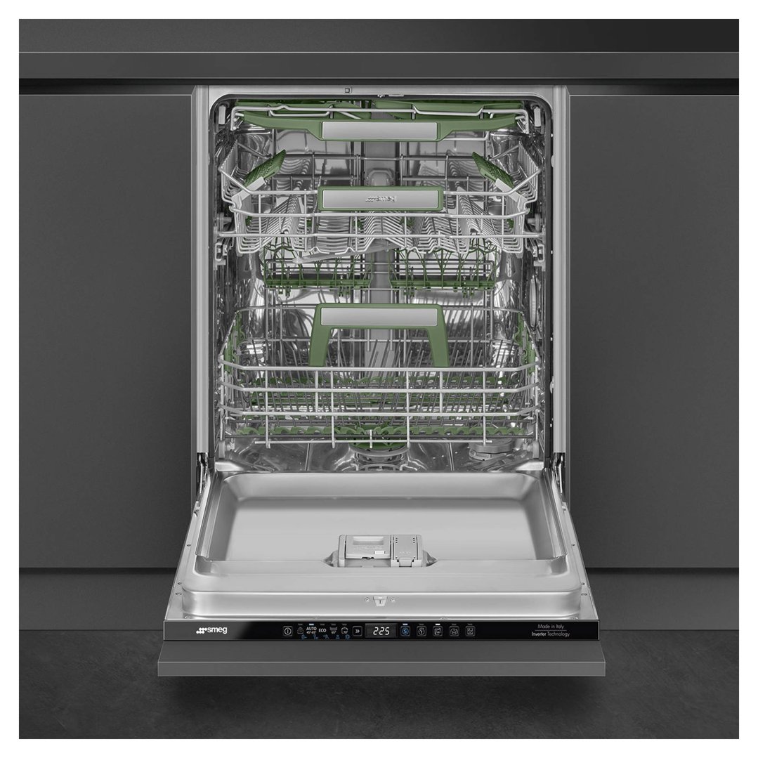Open built-in dishwasher with green racks in a dark kitchen setting