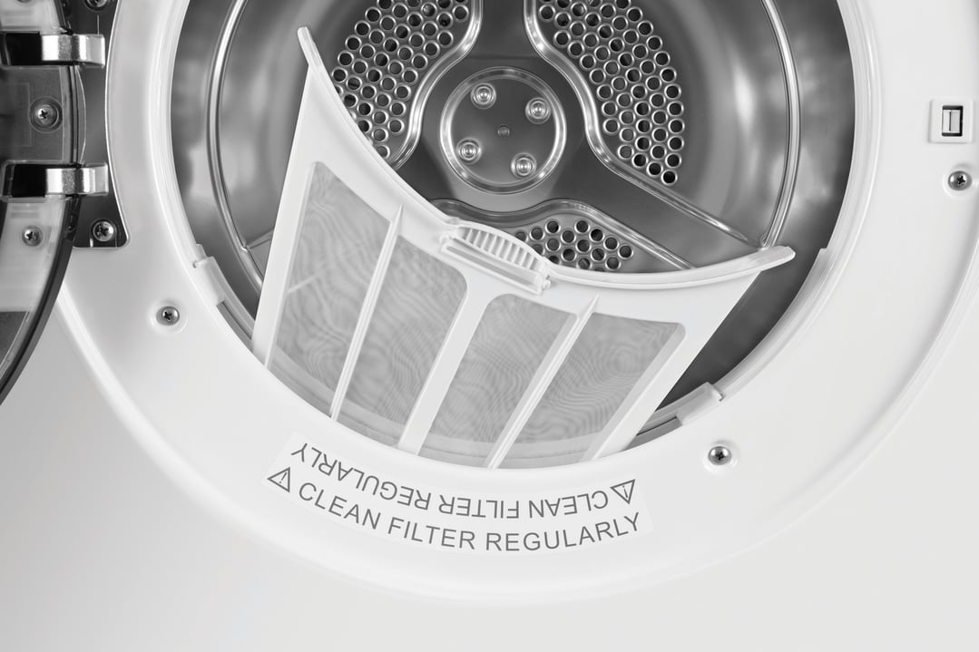 Close up of a Haier dryer drum with the lint filter partially removed