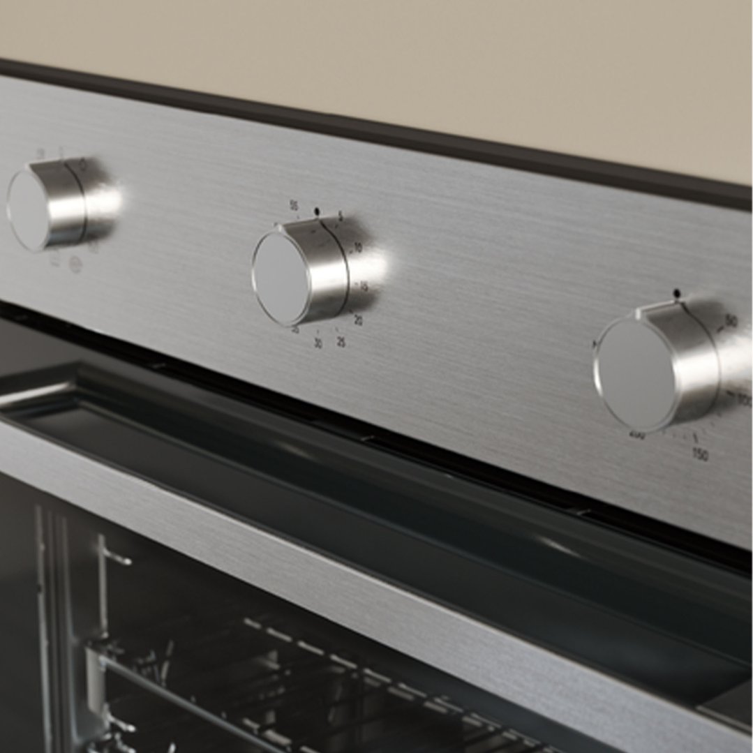 Close up of the control panel and open door of a built-in oven